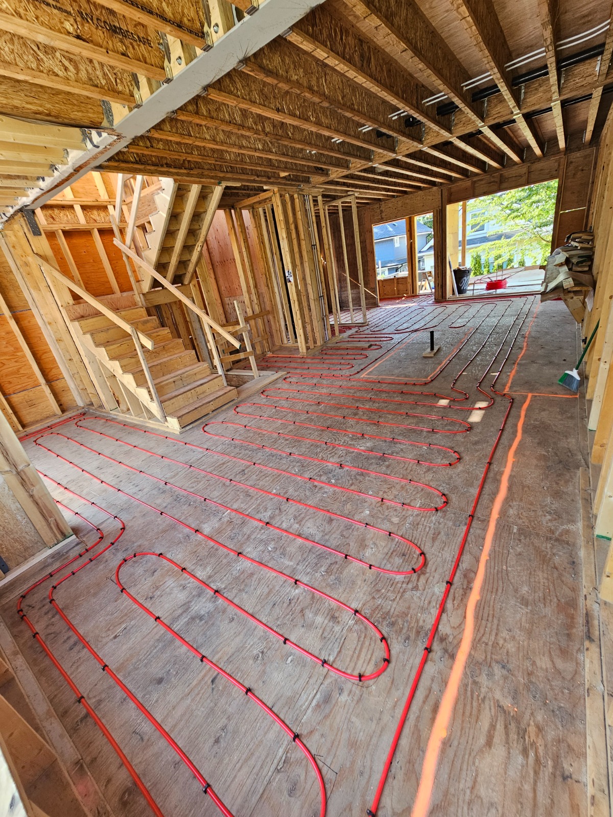 Radiant Floor Heating — Residential New Build — Radiant floor heating loops laid out before the floor pour.