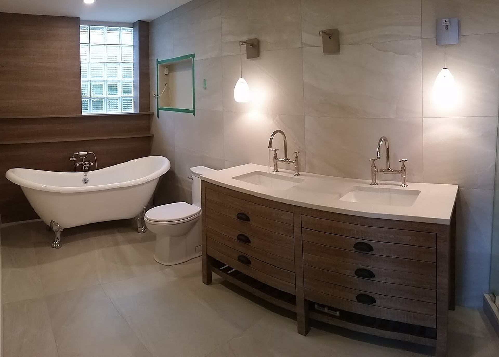 Residential Bathroom — New Build — Double vanity and freestanding tub in a residential new build.